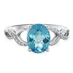 Prima Diamond & 9X7 Oval Blue Topaz Ring